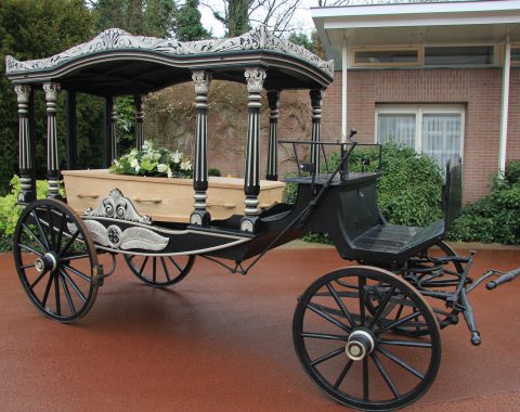 Adam & Greenwood - Classic funeral carriage with coffin